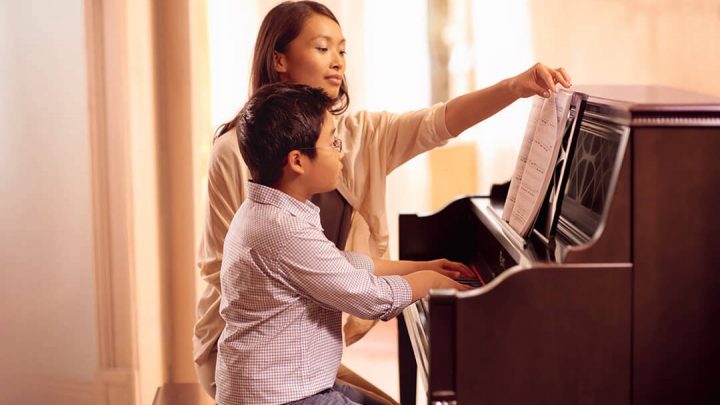 How playing the piano can help your child’s development